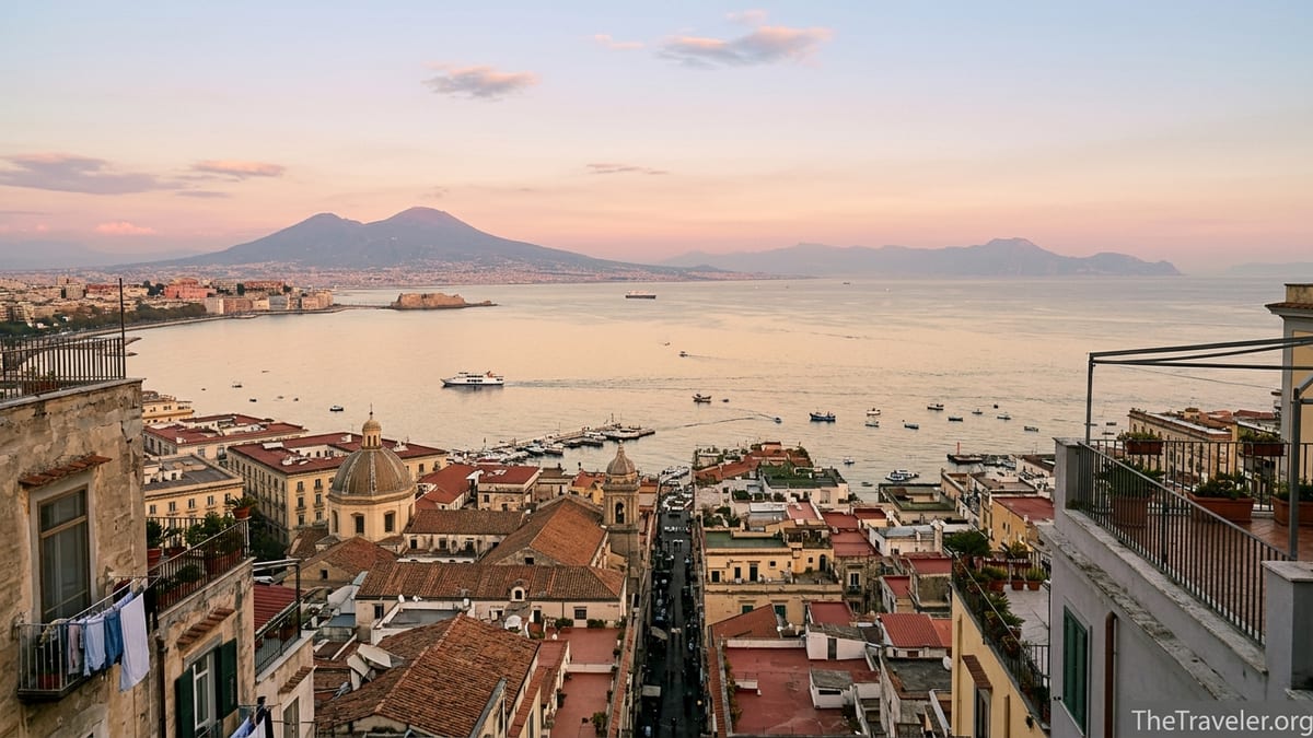 Evening view of Naples rooftops and Mount Vesuvius above the Bay of Naples.