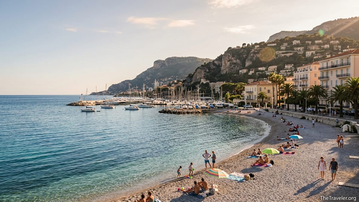 Golden hour view of Beaulieu-sur-Mer beach, marina and hills on the French Riviera.