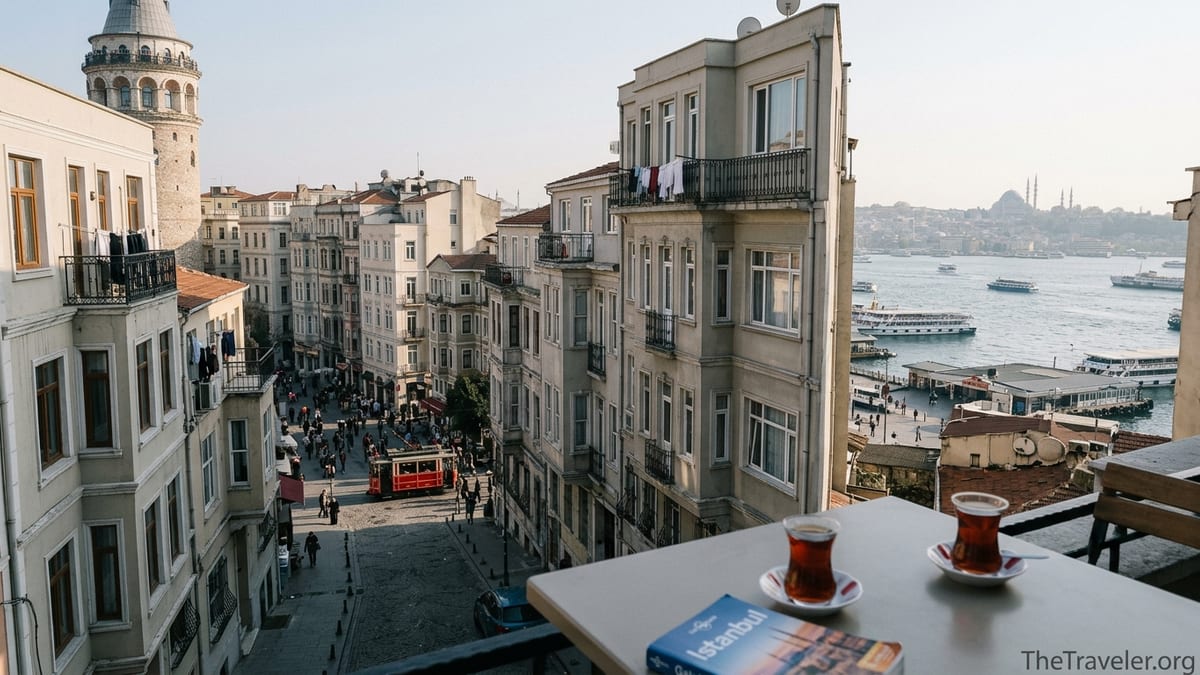 View over Beyoğlu from Galata with Galata Tower, Bosphorus and Old City skyline in afternoon light.