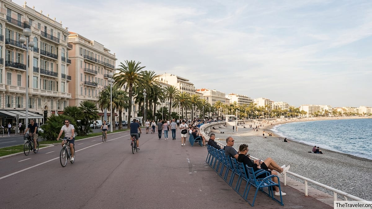 Promenade des Anglais in Nice’s Carré d’Or with Belle Époque buildings, palms and people by the sea