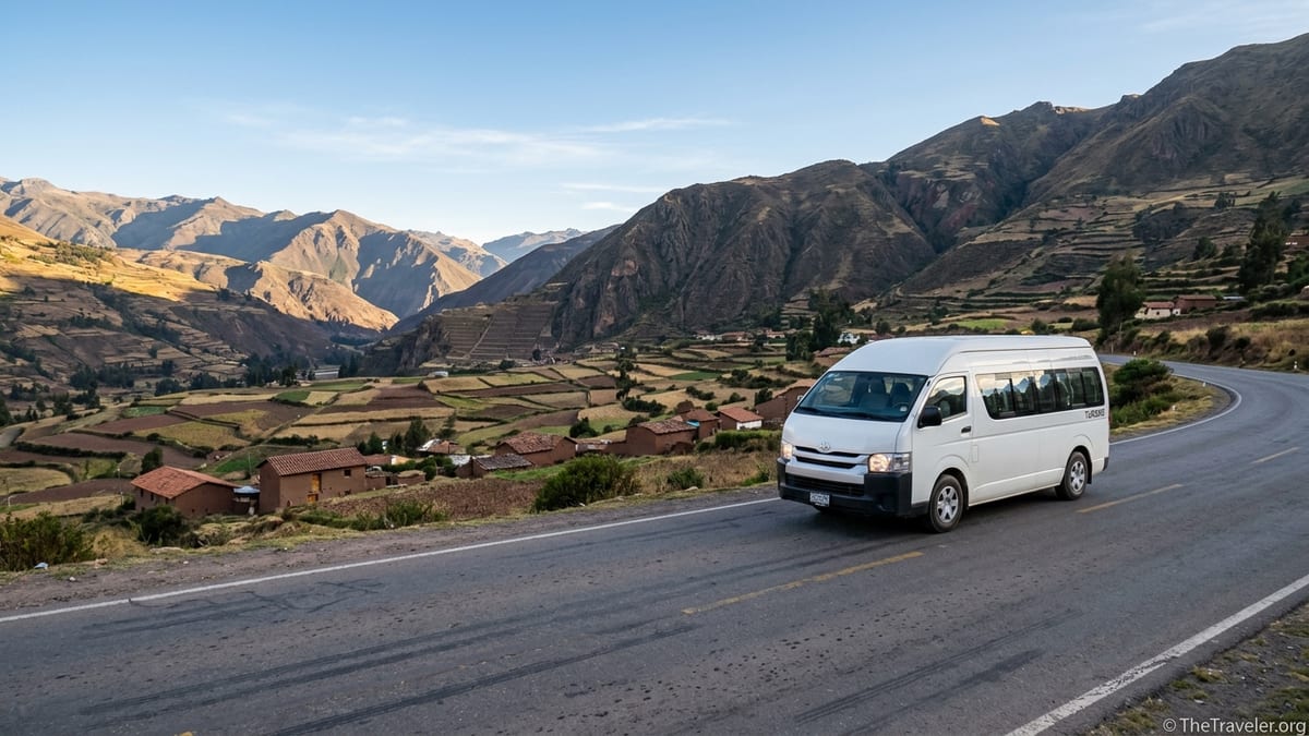 Private van driving from Cusco toward Ollantaytambo through Peru’s Sacred Valley at sunrise