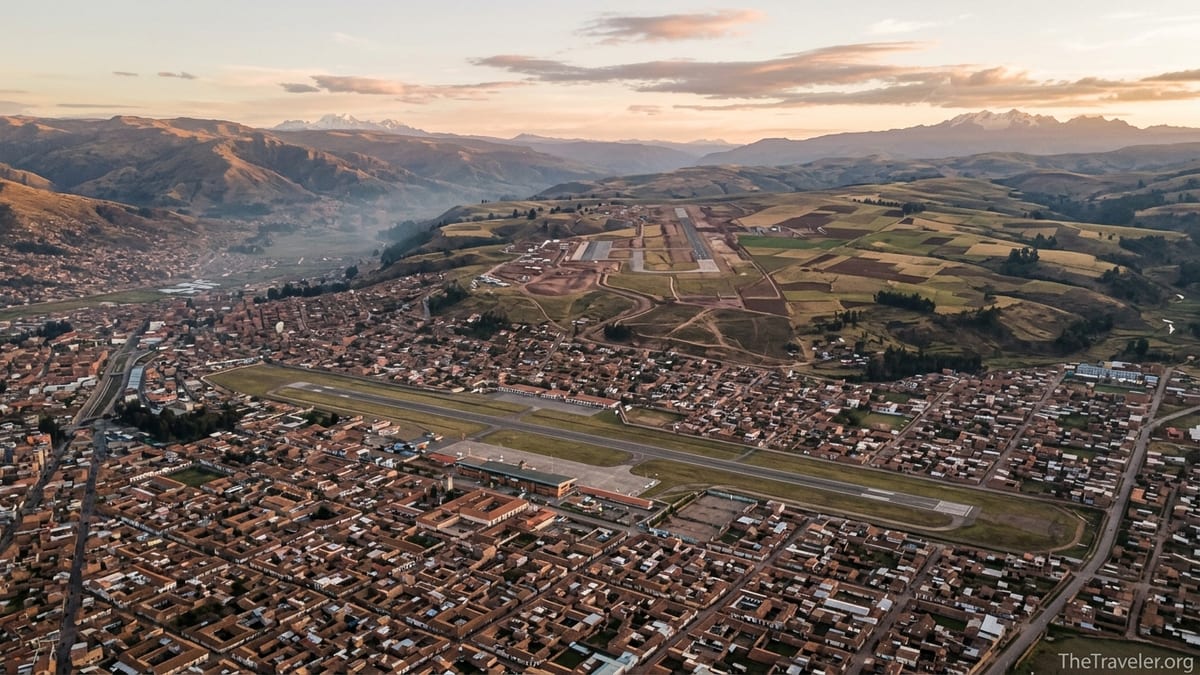 Aerial view of Cusco’s current airport in the valley with Chinchero plateau construction in the distance.