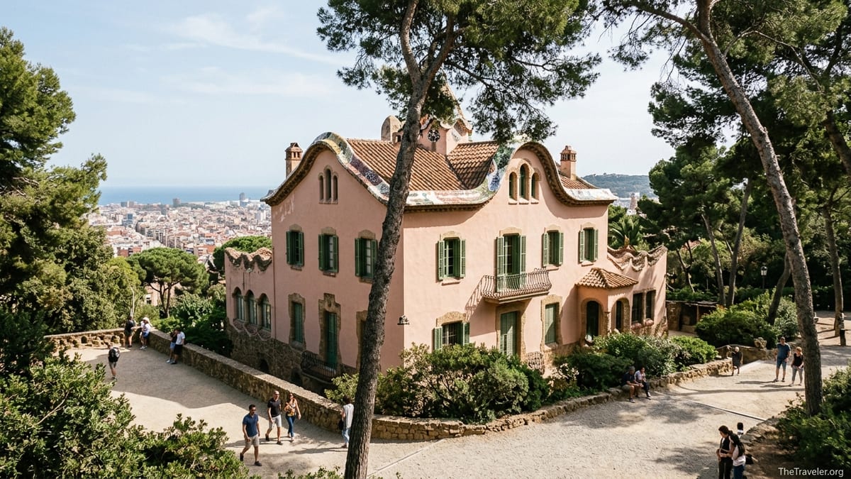 Gaudí House Museum in Park Güell surrounded by pine trees and overlooking Barcelona.