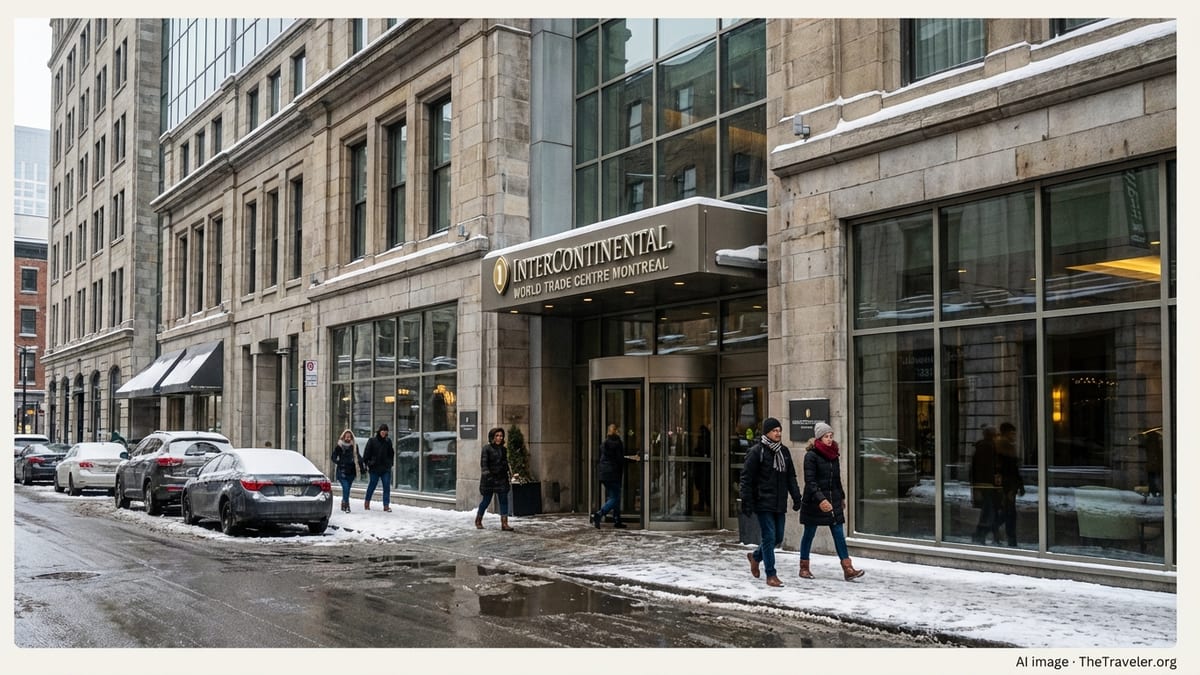 Street-level winter view of InterContinental Montreal entrance with pedestrians passing by.