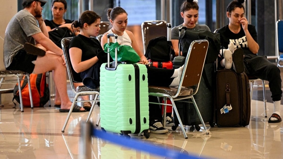 Iran war strands thousands on Bali as flights over Gulf halted