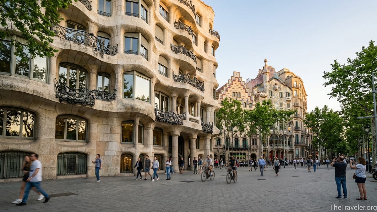 Golden hour street view of La Pedrera and Casa Batlló on Barcelona’s Passeig de Gràcia.
