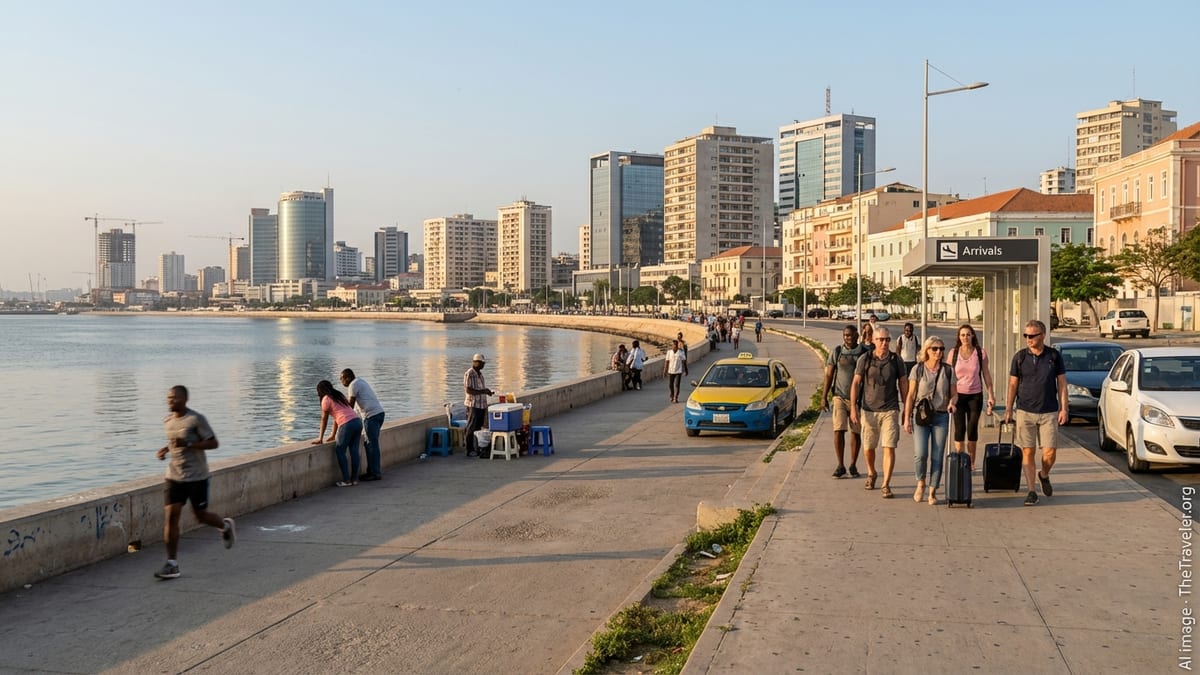 Late afternoon on Luanda's Marginal waterfront with travelers and city skyline.
