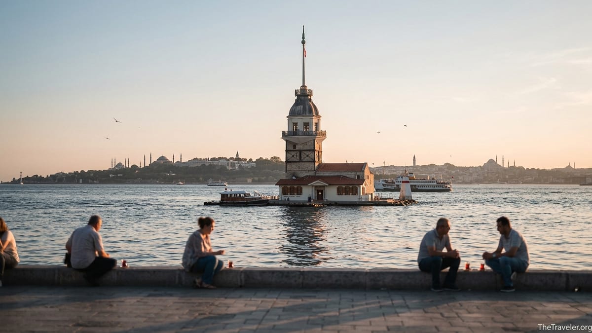 Maiden’s Tower seen from Salacak waterfront at sunset with Istanbul skyline behind.