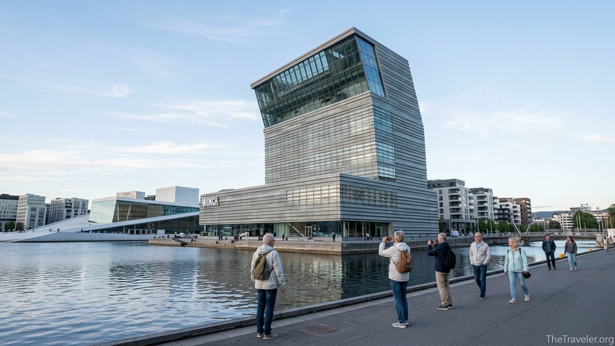 Visitors walking toward the MUNCH museum on Oslo’s Bjørvika waterfront at dusk.