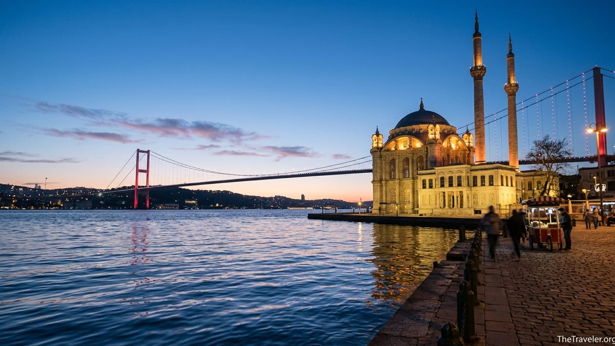 Evening view of Ortaköy Mosque and the Bosphorus Bridge lit above the Bosphorus waterfront square.