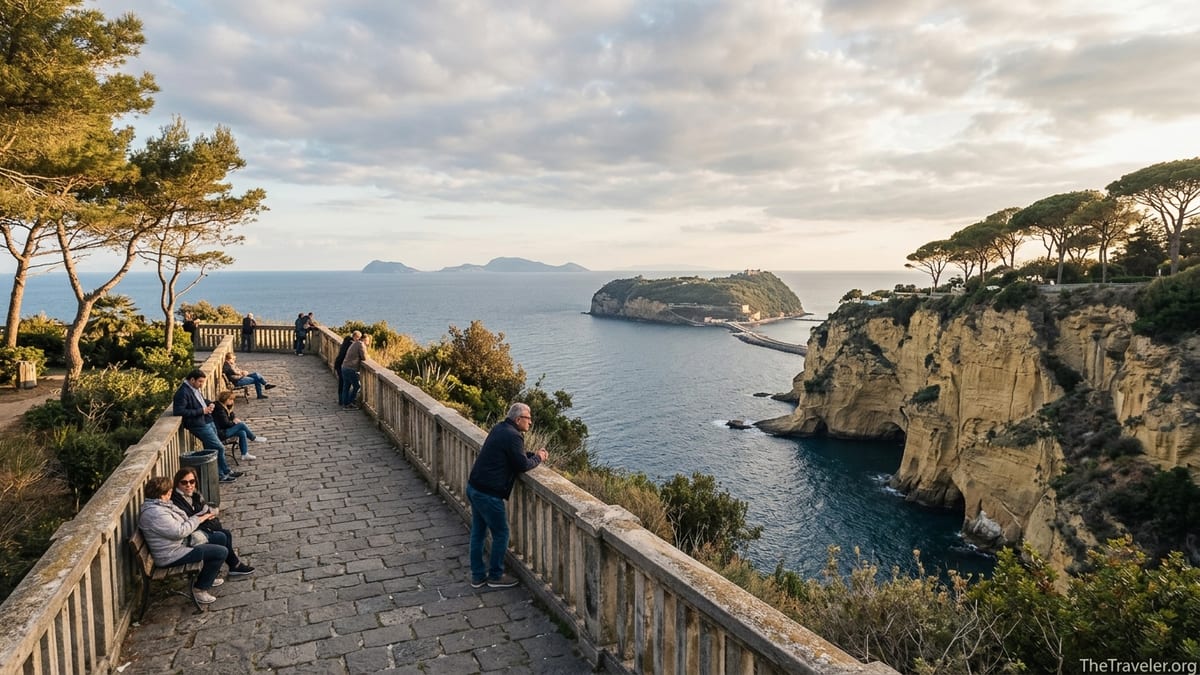 Side terrace in Parco Virgiliano overlooking Naples bay and Nisida at sunset