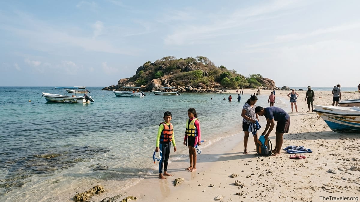 Family with children in life jackets on the beach at Pigeon Island near Nilaveli, Sri Lanka, with boats and rocky island in背景