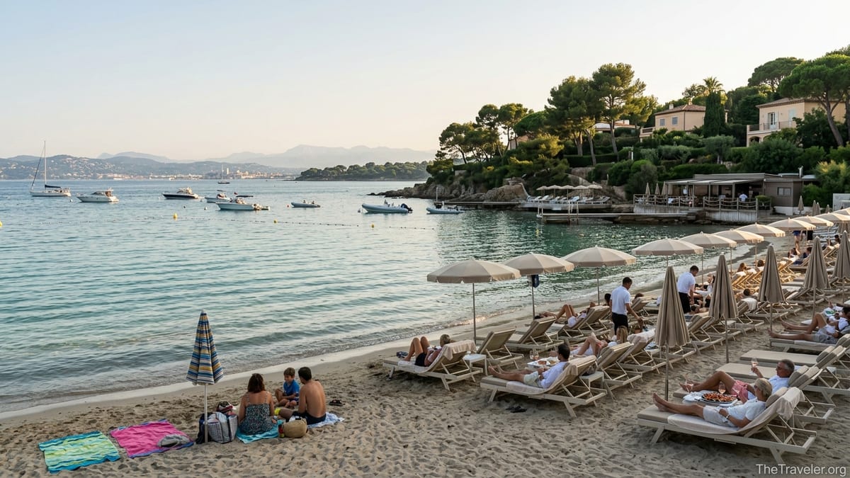 View of Plage de la Garoupe showing public sand beside an exclusive beach club on Cap d’Antibes.