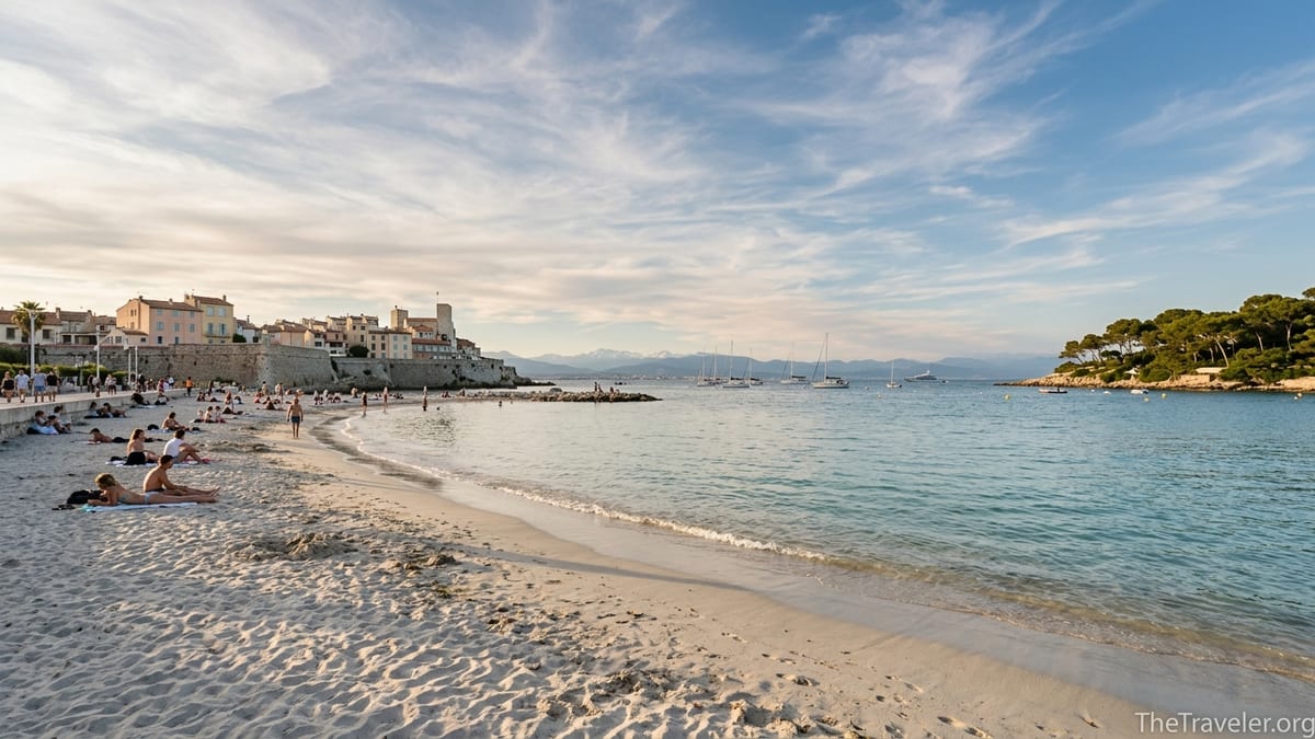 Late afternoon view over Plage de la Salis toward Antibes old town and Cap d’Antibes.