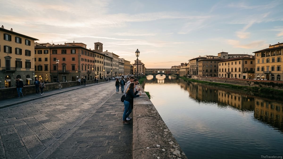 View from Ponte alla Carraia over the Arno River toward Florence’s historic bridges at sunset.