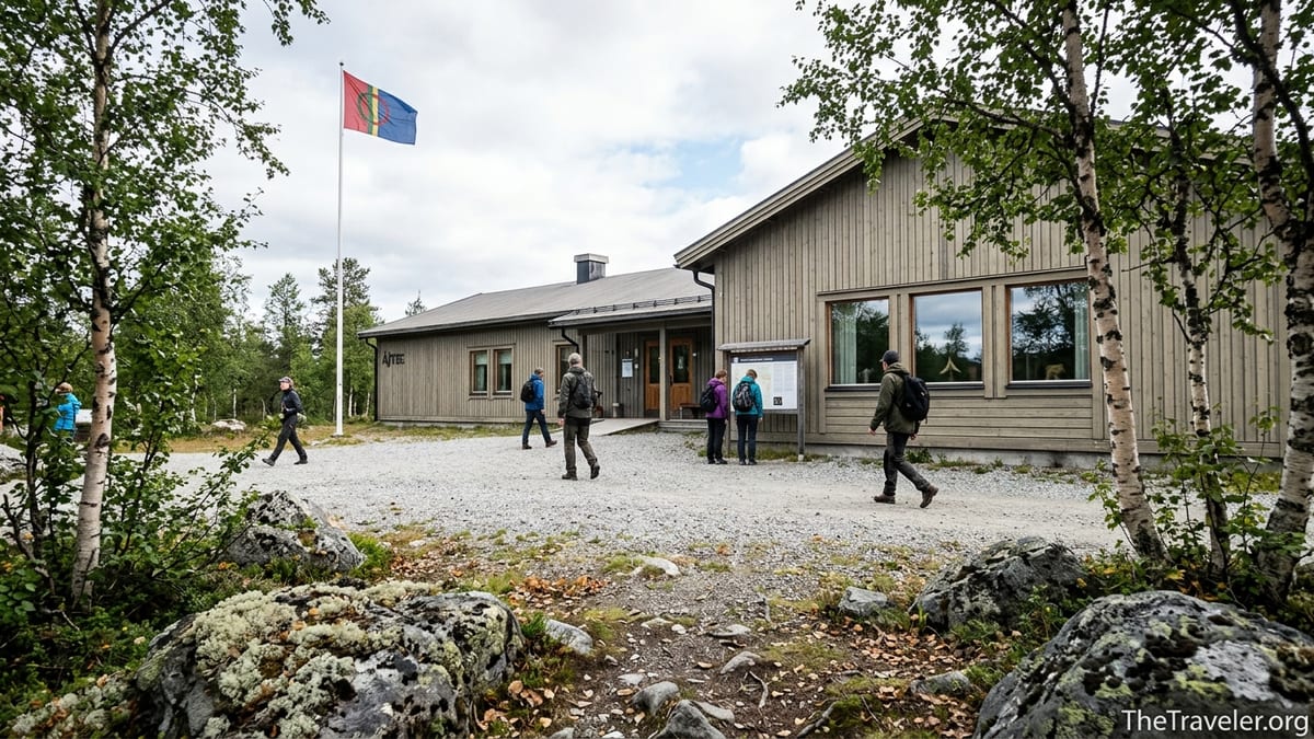 Visitors walking toward the entrance of Ájtte, the Swedish Mountain and Sámi Museum in Jokkmokk.