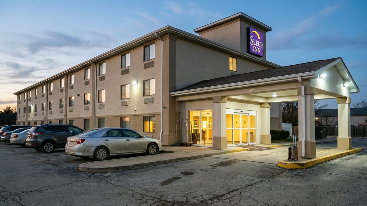 Sleep Inn hotel at dusk, highlighting the difference between marketing and reality. 