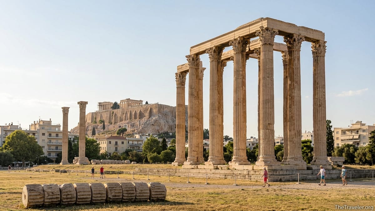 Surviving Corinthian columns of the Temple of Olympian Zeus in Athens with the Acropolis in the background.