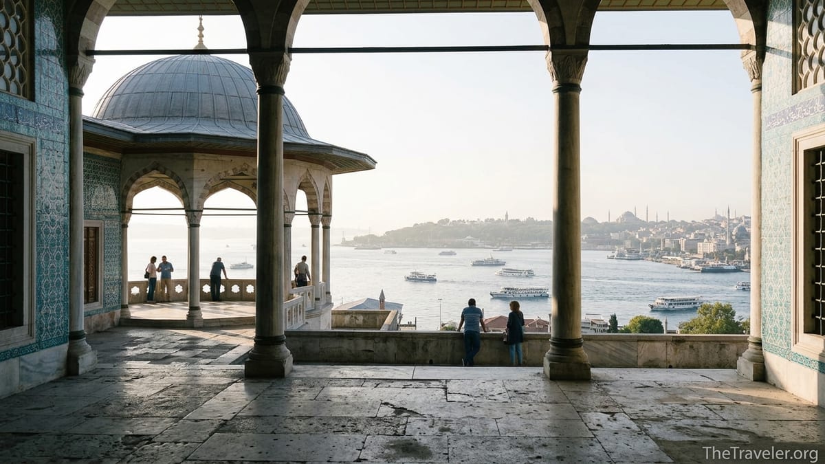 Visitors admire Bosphorus views from a colonnaded terrace inside Topkapı Palace in Istanbul.